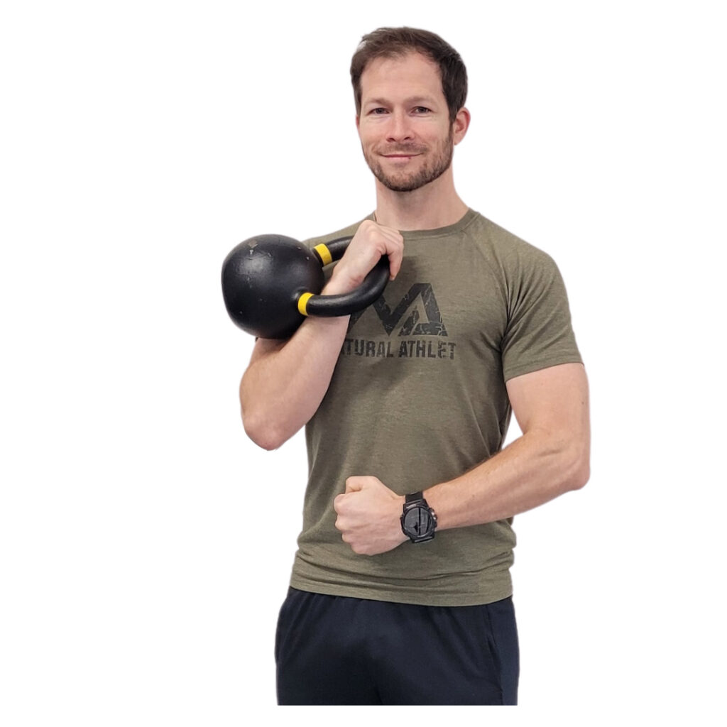 Coach Gerald Freidorfer mit Kettlebell auf Home Seite